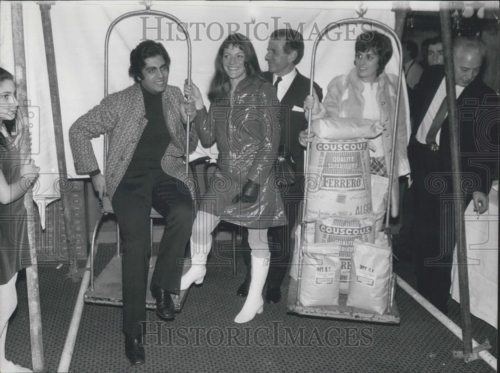 1970, Enrico Macias and Wife Get Coucous Load with Anne-Marie Peysson - Historic Images