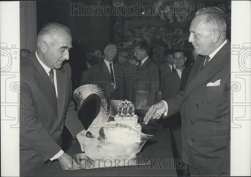 1960, Sauger and Chardon Admiring a Magnificent Swan Ice Sculpture - Historic Images