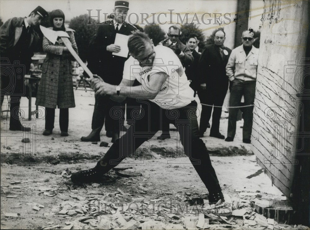 1970 Maurice Poirot During a Lumberjack Competition - Historic Images