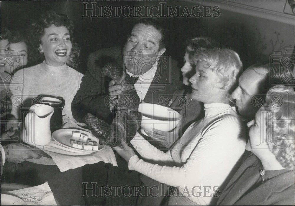 1954 Gabriello Enjoying a Cafe au Lait with Giant Croissant - Historic Images