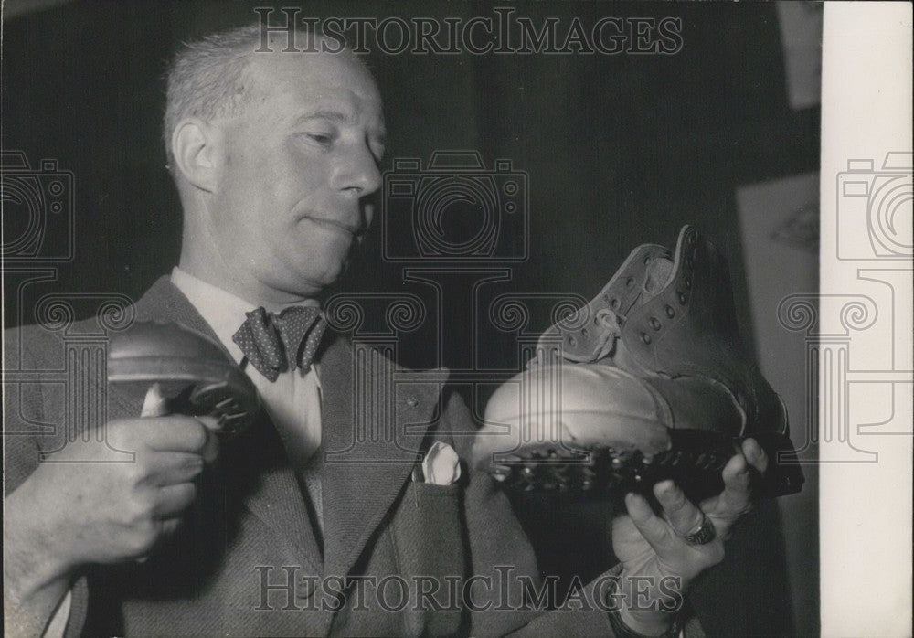 1950 Press Photo Man Holds Miners, Construction & Metal Workers Steel Toed Boots-Historic Images