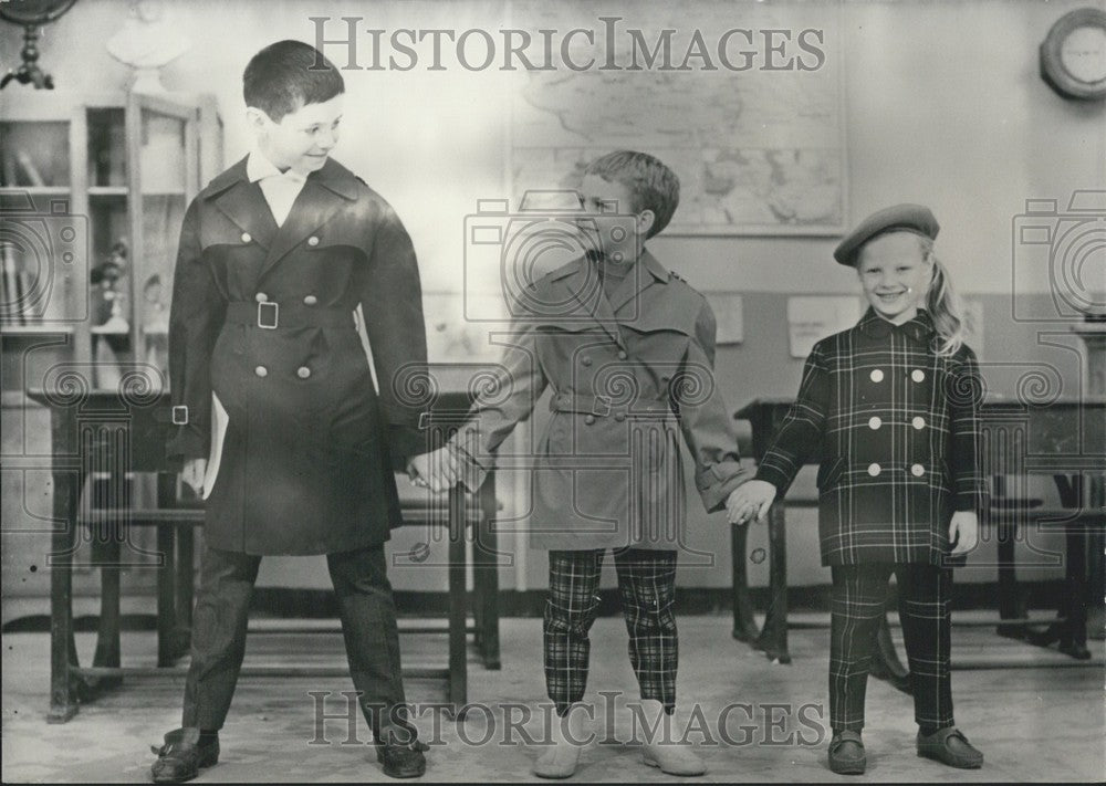 1962 Press Photo Navy &amp; Beige Trench Coats for Boys; Girl&#39;s Tartan Coat &amp; Pants-Historic Images