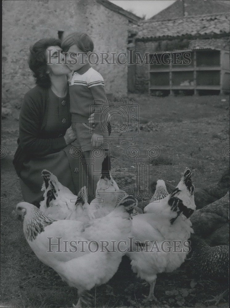 1964, Kidnapped Boy Returned: Mrs. Biet with Son, Joel, on their Farm - Historic Images