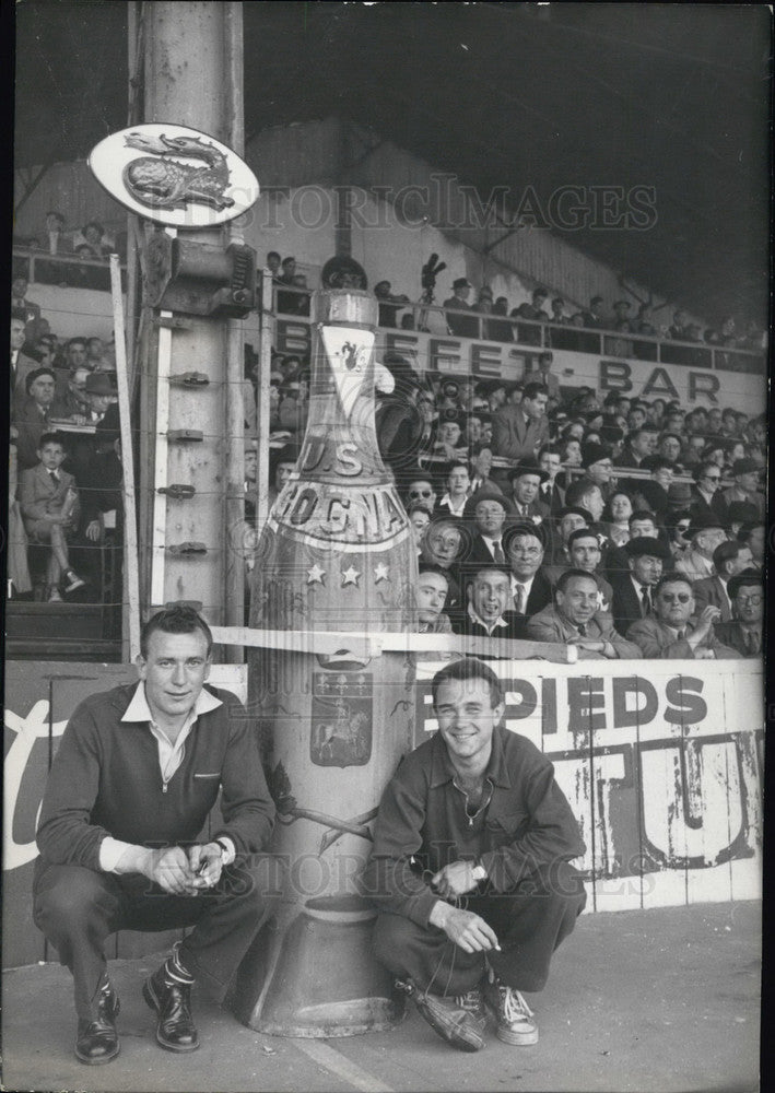 Press Photo Cognac Fans Pose with Fake Plastic Bottle, Quarter Finals, Buffalo - Historic Images