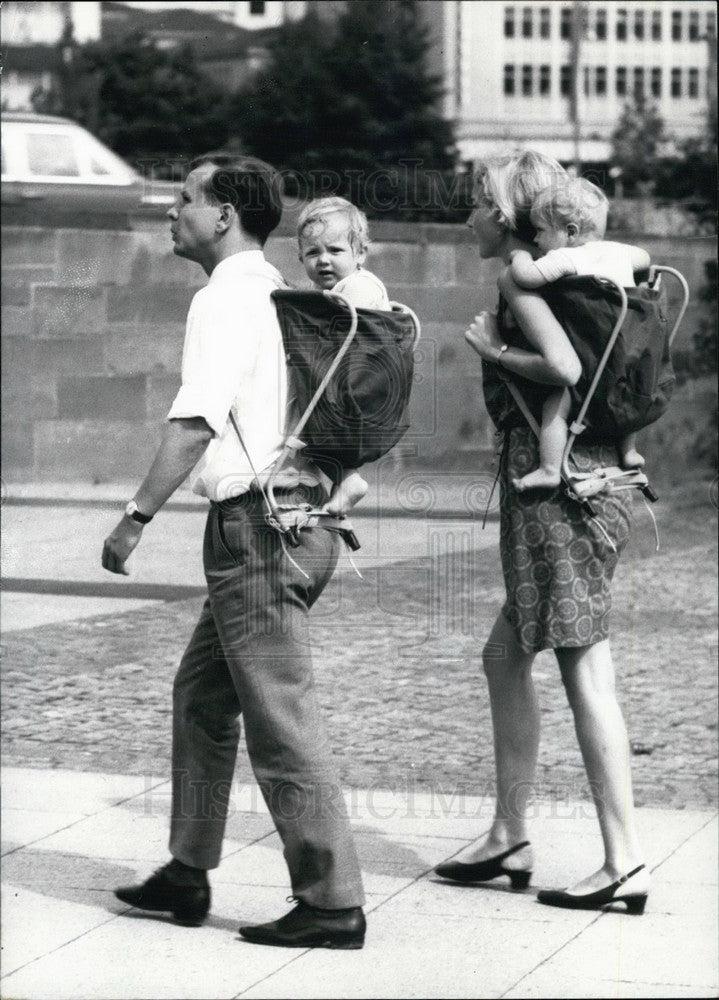 1969, Parents Walking with Children in Backpacks. Kassel - Historic Images