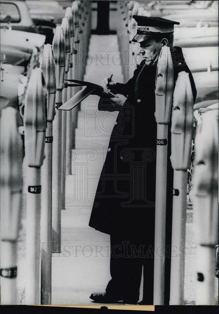 1968 Press Photo Policeman Writing Citation. Photo Exhibition in Koeln.-Historic Images