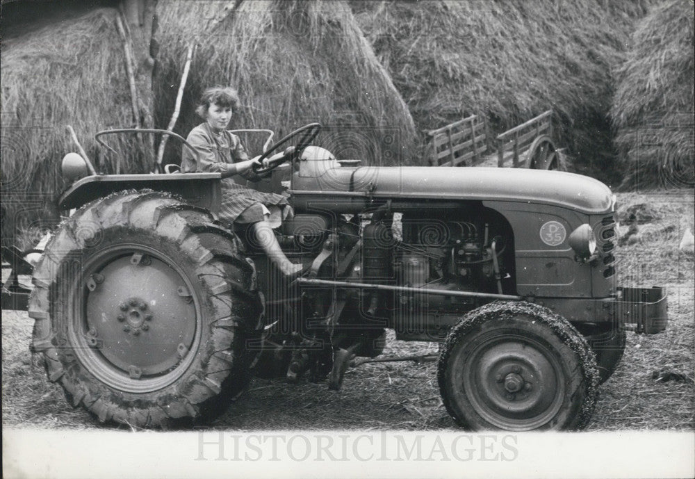 1960 Little Girl, Reine Omnes, Driving a Tractor - Historic Images