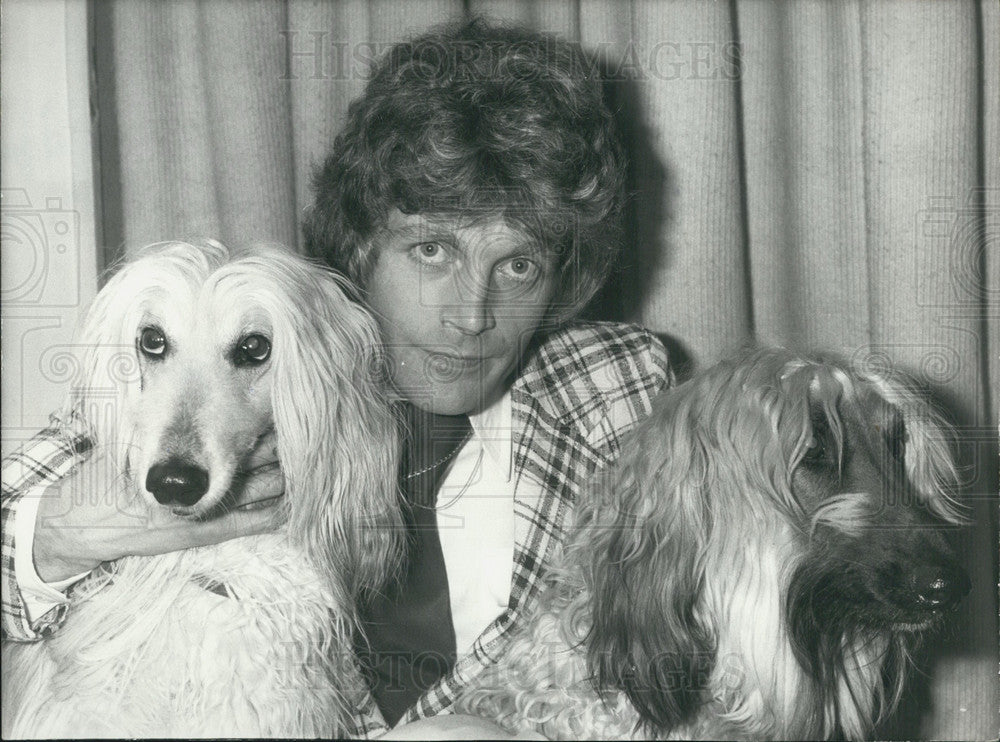 1977, Designer Henry Courant and his Afghan Hounds - Historic Images