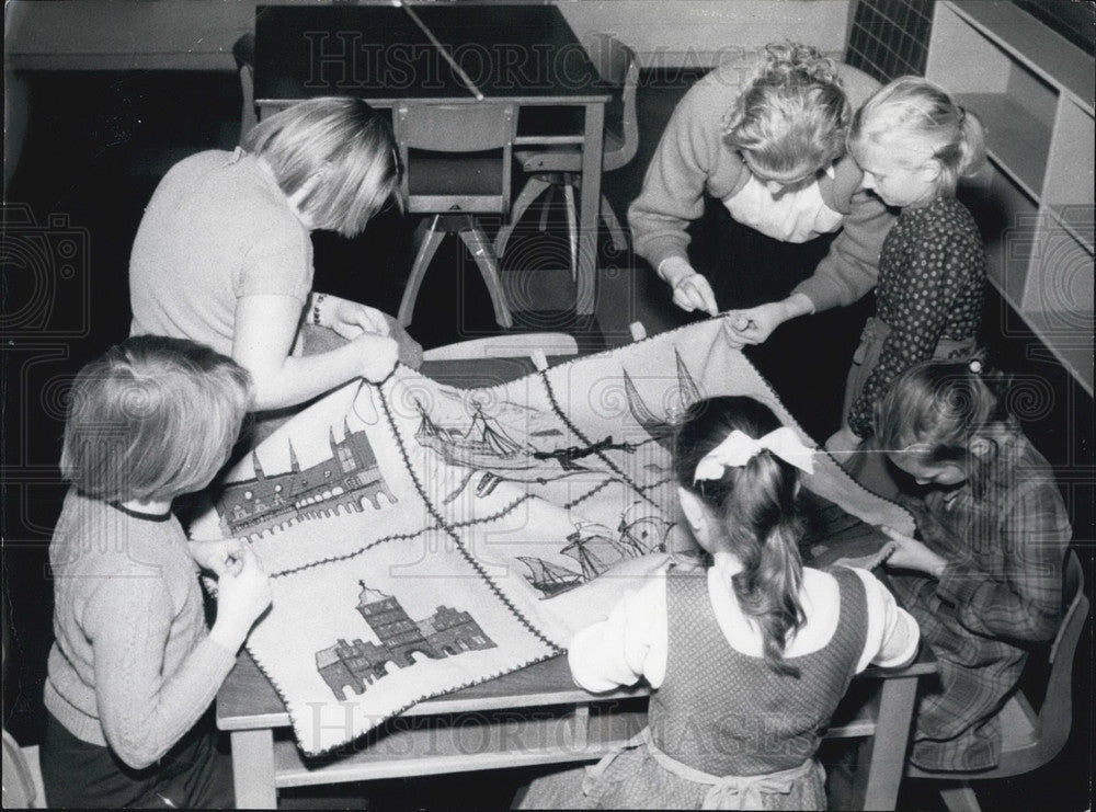 1956 German Girls Make Tapestry for Dr. Schweitzer. - Historic Images