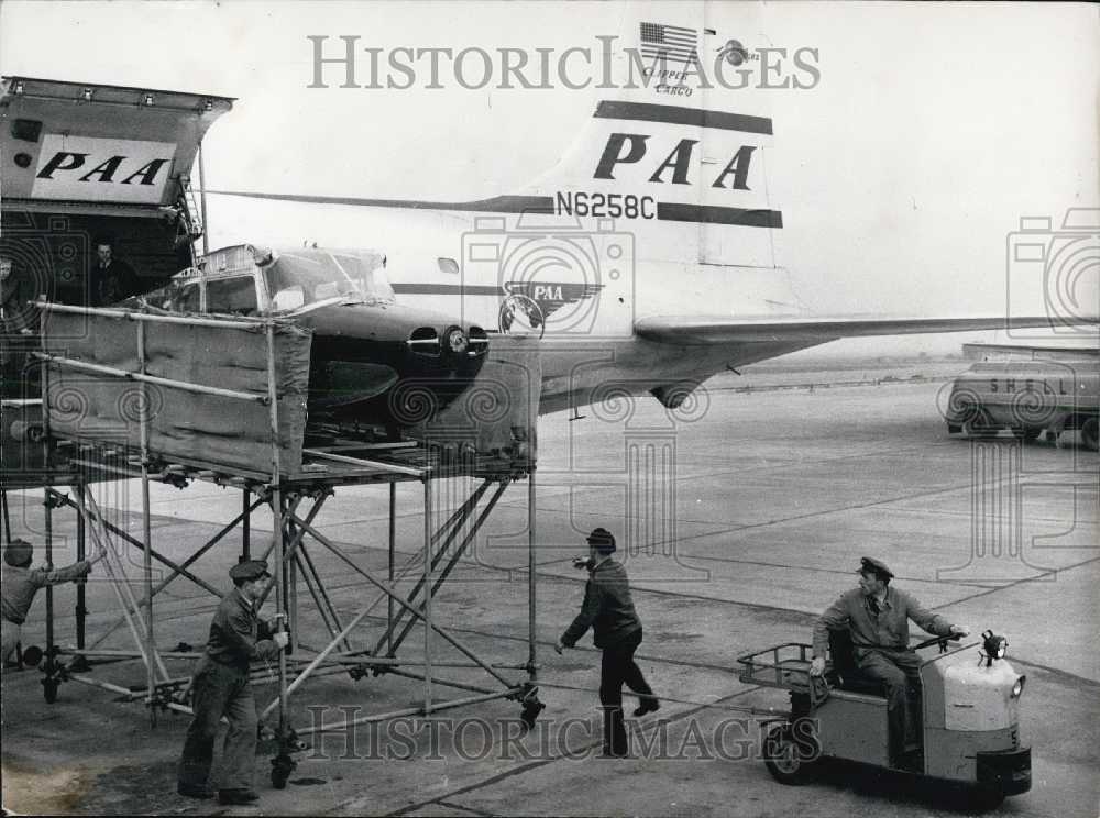 1957 Press Photo Cesna 170 in Cargo Plane. Bound for Germany.-Historic Images