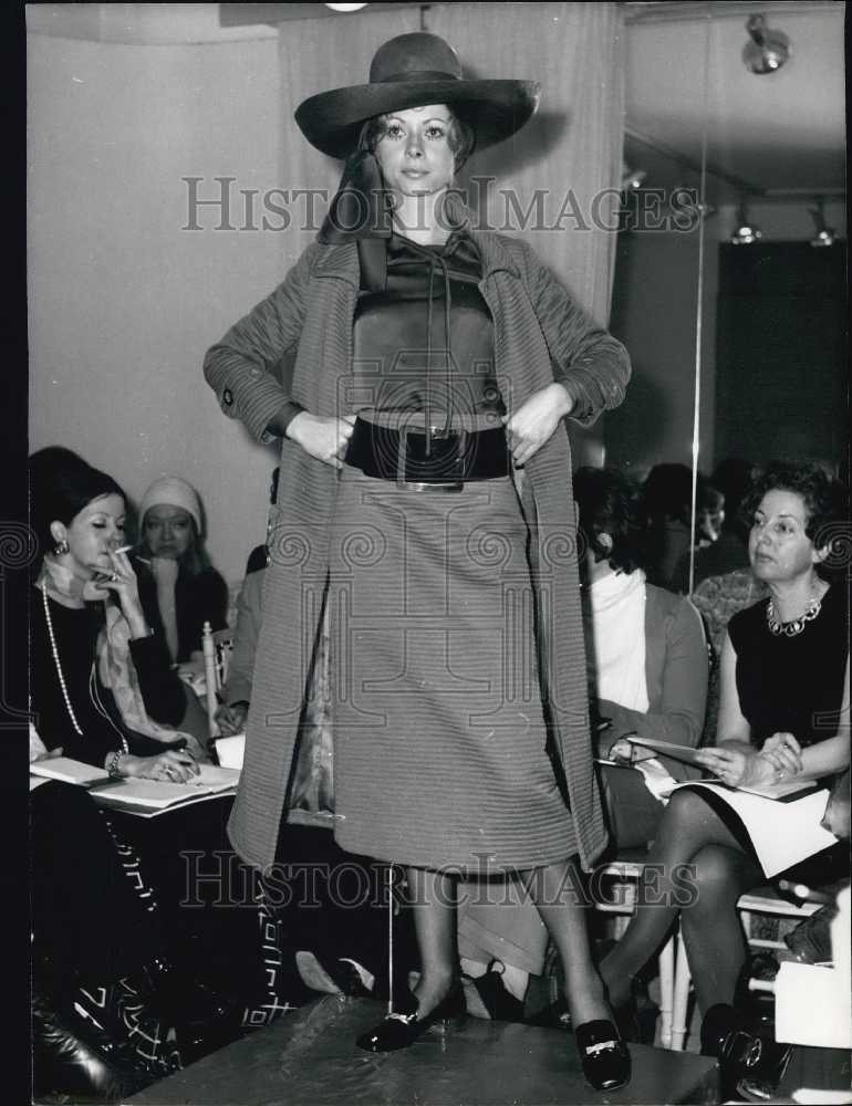 1970 Press Photo Woman Modeling Long Coat Red Cotton Skirt Gilded Eyelet Sleeves-Historic Images