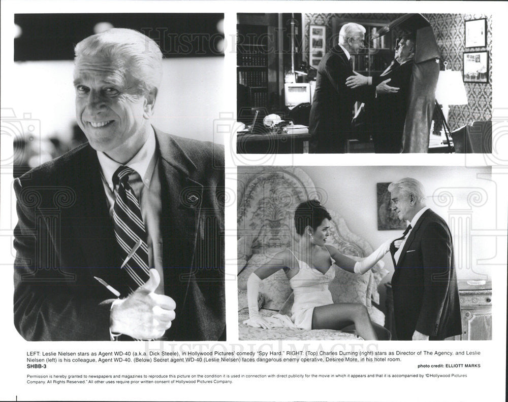 1996 Press Photo Leslie Nielsen Actor Charles Durning Scenes Spy Hard Comedy - Historic Images