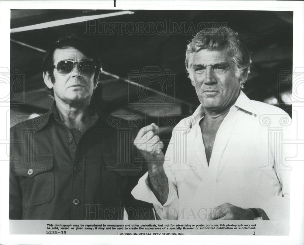 1980 Press Photo Stuart Whitman Gene Barry Actors Guyana Cult Damned - Historic Images