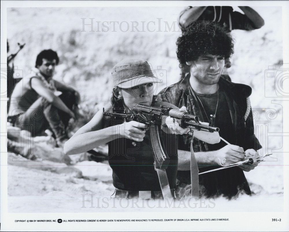 1984 Press Photo Woman shooting machine gun IN ACTION MOVIE - Historic Images