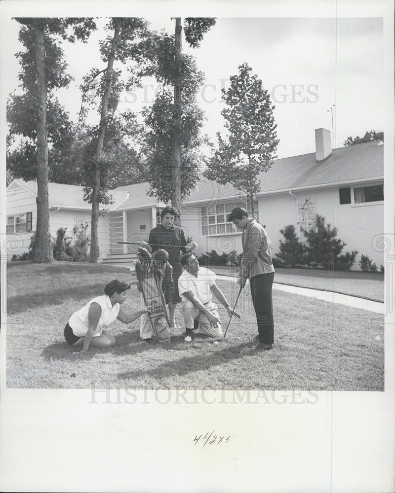 1959 Press Photo Paul Anka gets golfing pointers from his dad - Historic Images