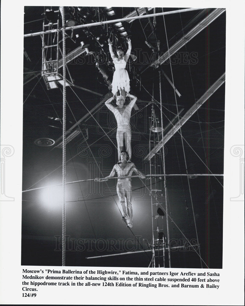 Press Photo Fatima, Igor Arefiev and Sasha Mednikov perform aerial stunts. - Historic Images