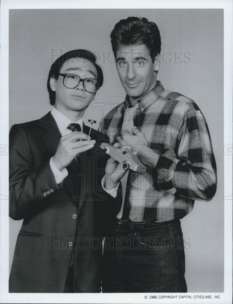 1986 Press Photo Actor Gedde Watanabe and Scott Bakula - Historic Images