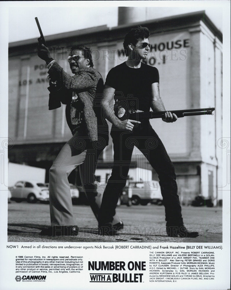 1986 Press Photo Robert Carradine &amp; Billy Dee Williams Number One With A Bullet - Historic Images