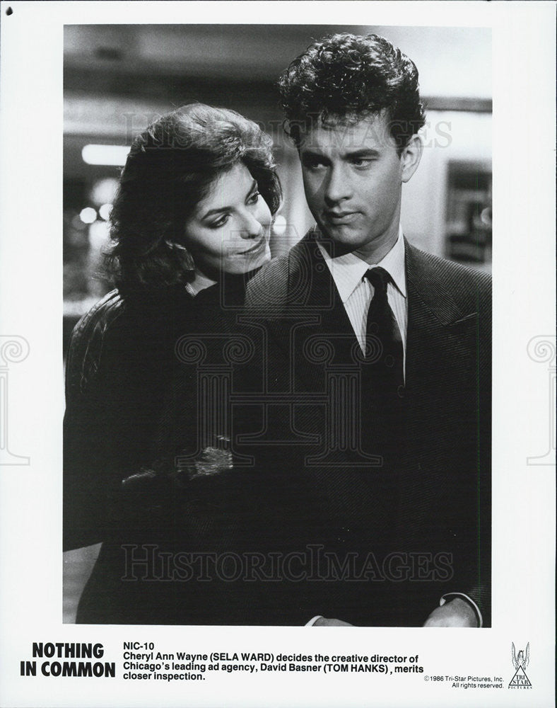 1986 Press Photo of Sela Ward and Tom Hanks in &quot;Nothing in Common&quot; - Historic Images