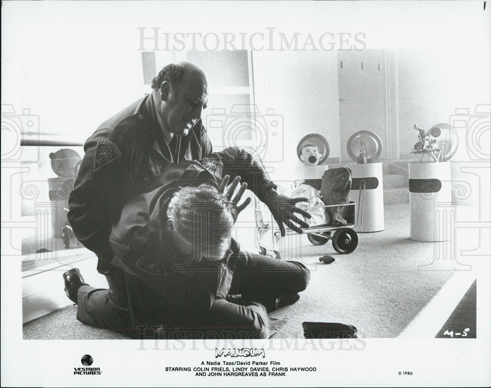 1986 Press Photo Scene From The Movie &quot;Malcom&quot; - Historic Images