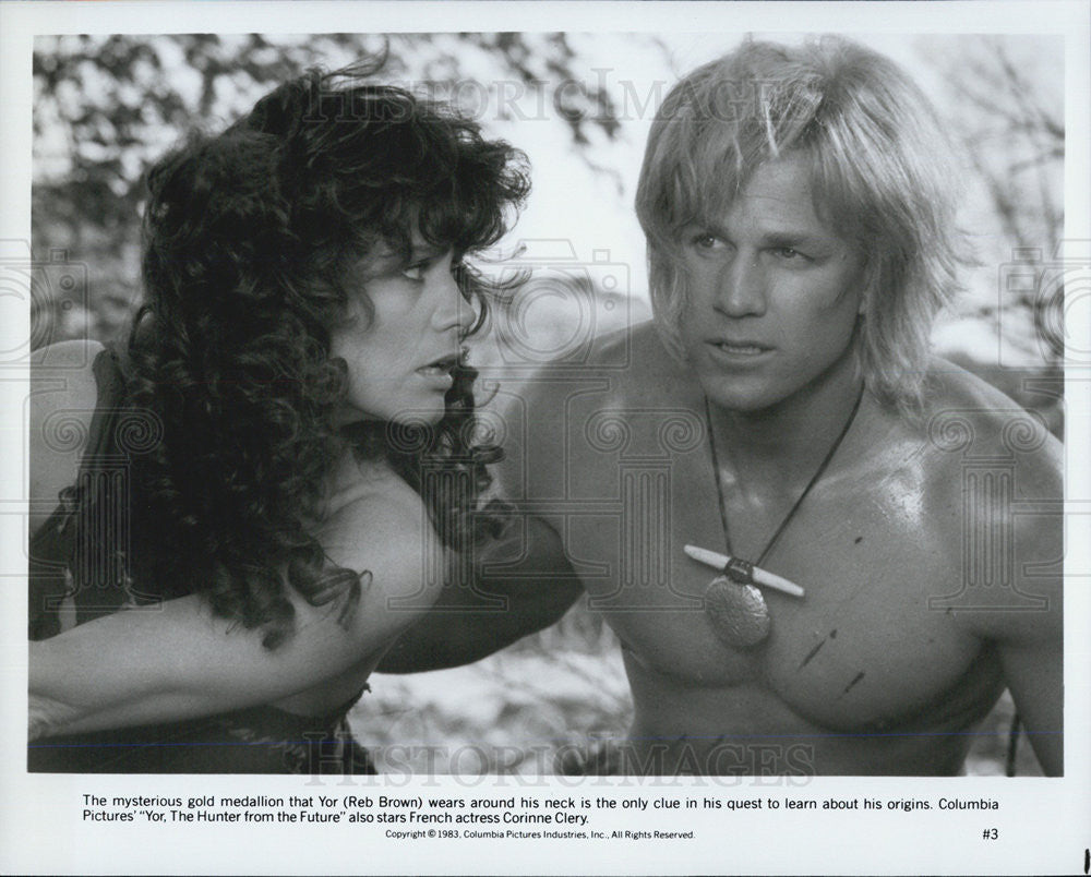 1983 Press Photo Red Brown &amp; Corinne Clery in &quot;Yor, The Hunter from the Future&quot; - Historic Images