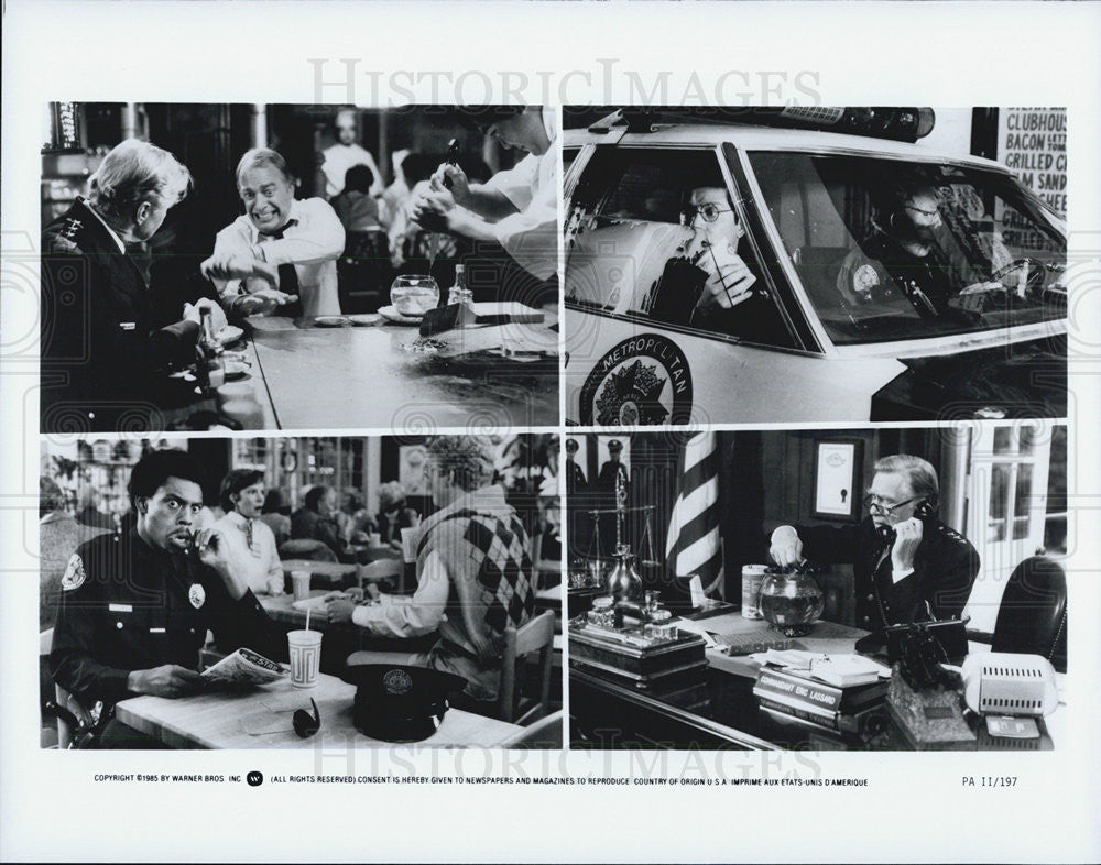 1985 Press Photo movie actor police officer cruiser telephone - Historic Images