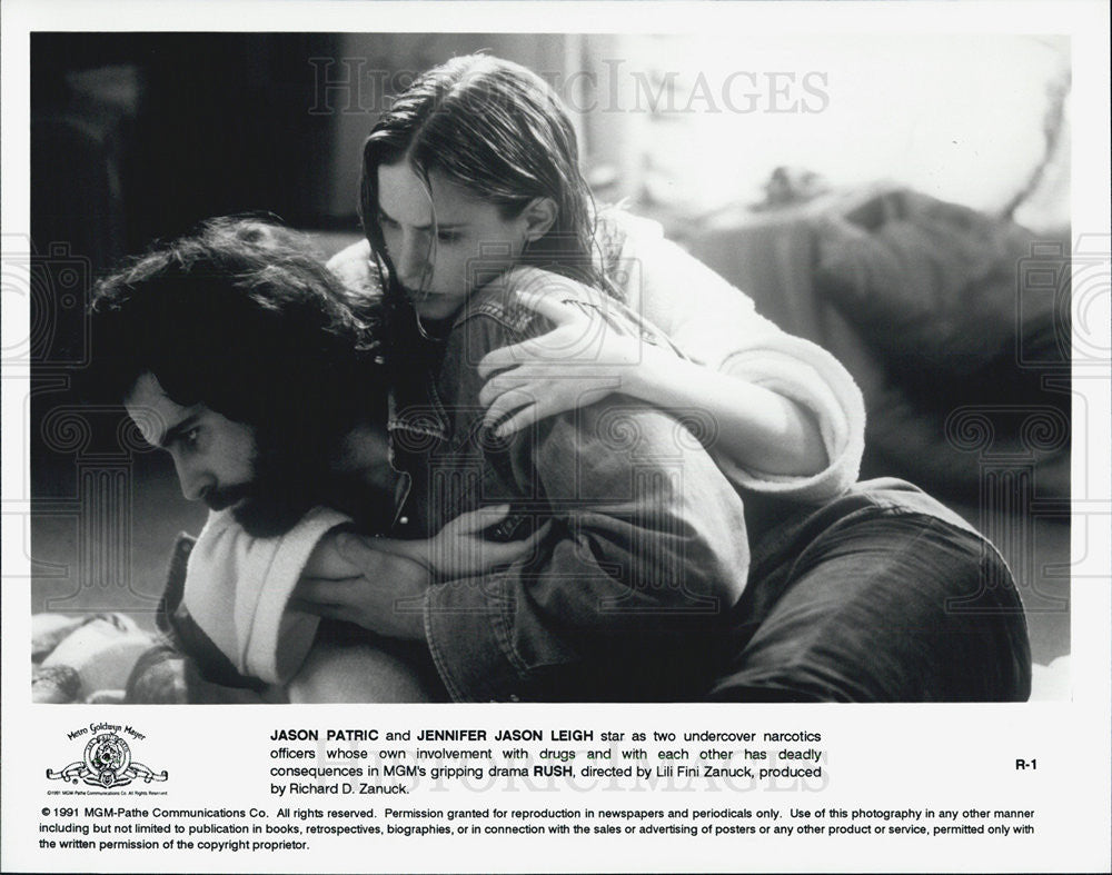 Press Photo of Jason Patric and Jennifer Leigh stars in Rush. - Historic Images