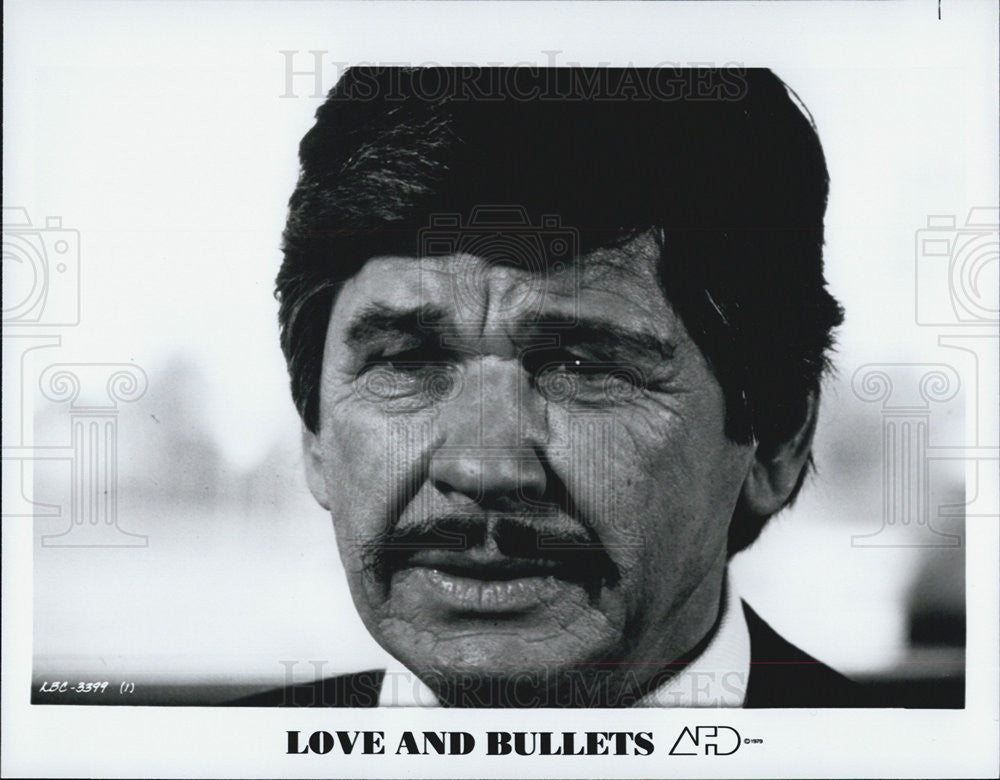 Press Photo Scene from Love And Bullets - Historic Images