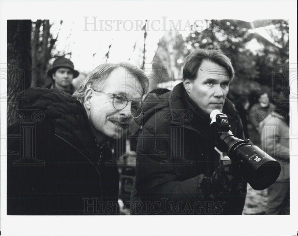 Press Photo Photographers standing outdoors - Historic Images