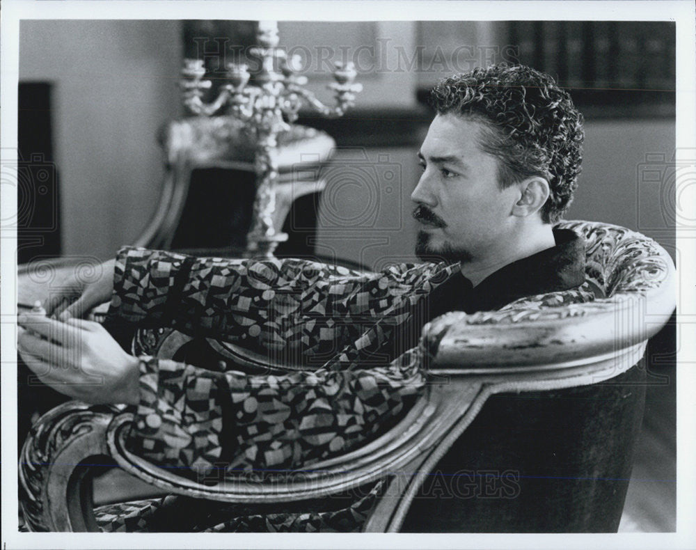 Press Photo Man Sits In Chair - Historic Images