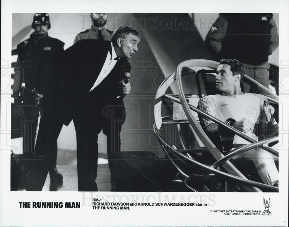 1987 Press Photo Richard Dawson &amp; Arnold Schwarzenegger stars in &quot;The Running Man&quot; - Historic Images