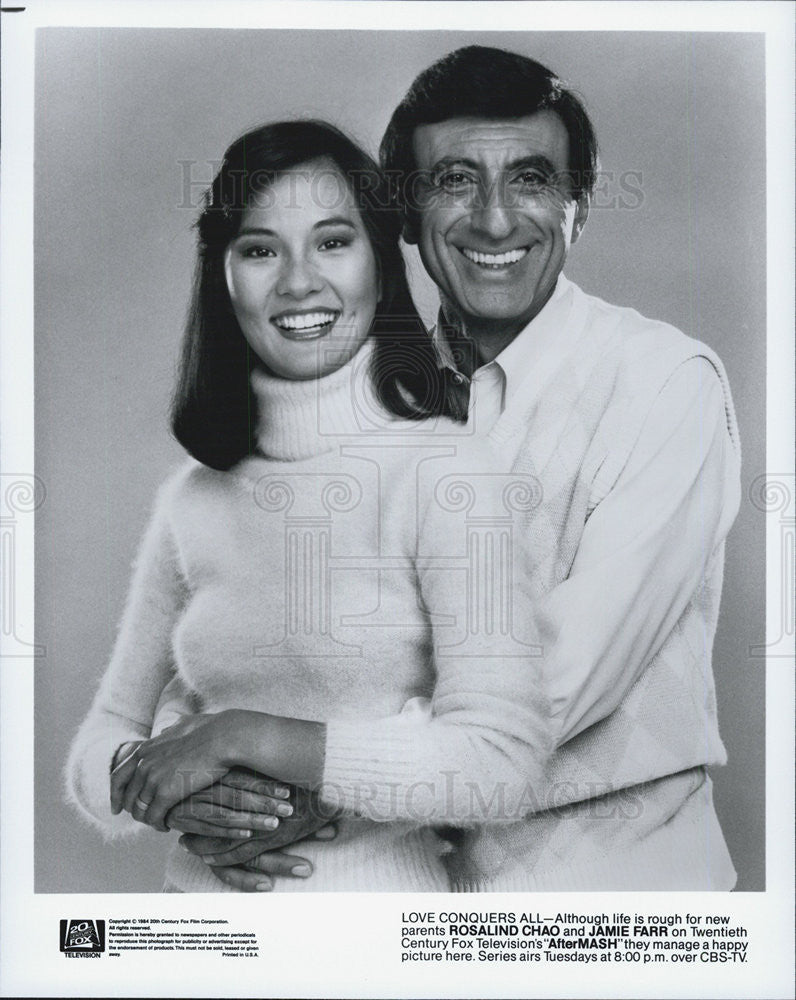 1984 Press Photo Rosalind Chao and Jaime Farr star as new parents in &quot;AfterMASH&quot; - Historic Images