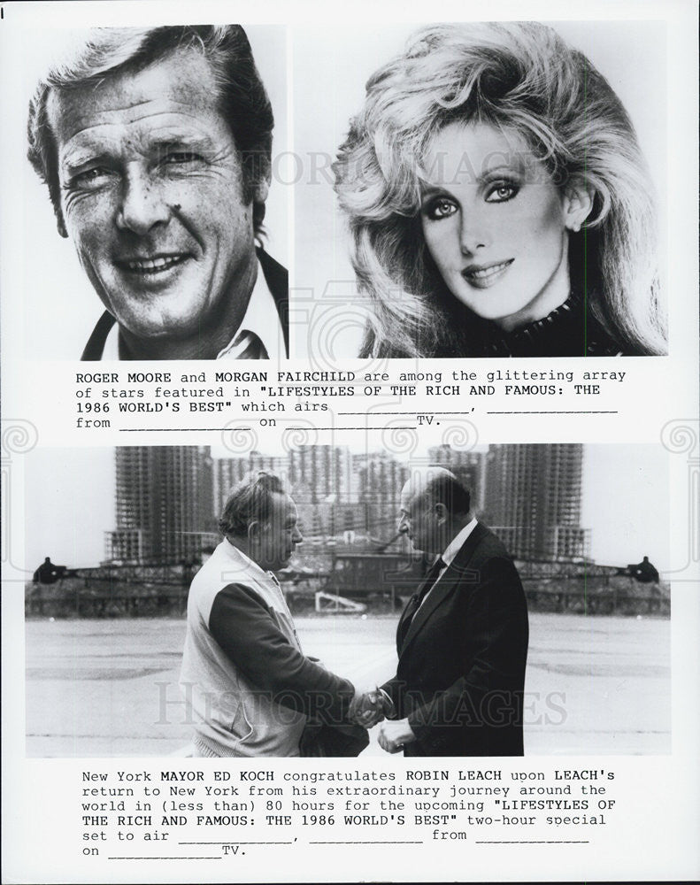 1986 Press Photo Actors Roger Moore, Morgan Fairchild, New York Mayor Ed Koch - Historic Images