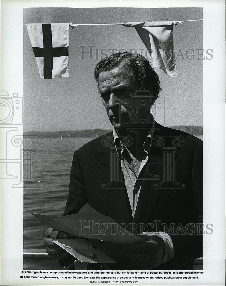 1985 Press Photo Michael Caine in &quot;The Holcroft Covenant&quot;- Historic Images