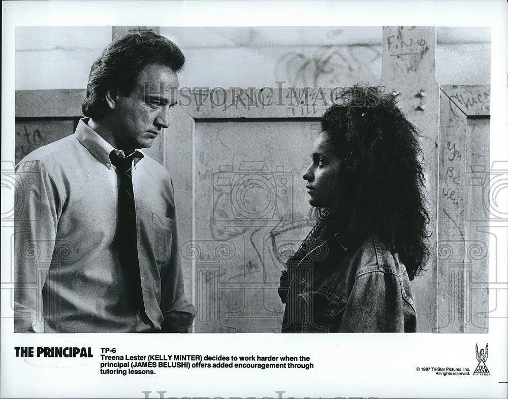 1987 Press Photo Actress Kelly Minter and Actor James Belushi in &quot;The Principal&quot;- Historic Images