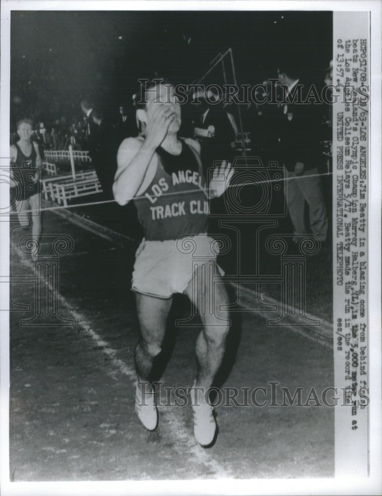 1963 Press Photo Jim Beatty Beats Olympic Champ - Historic Images
