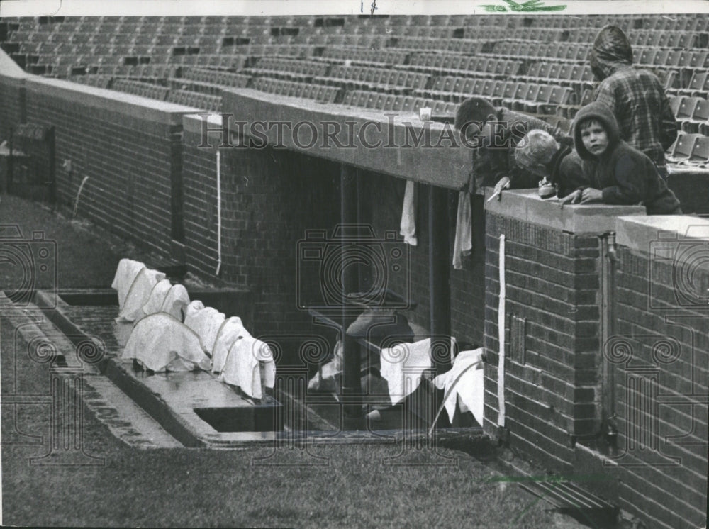 1967 Towels Cover Ball Player Bats Raining - Historic Images