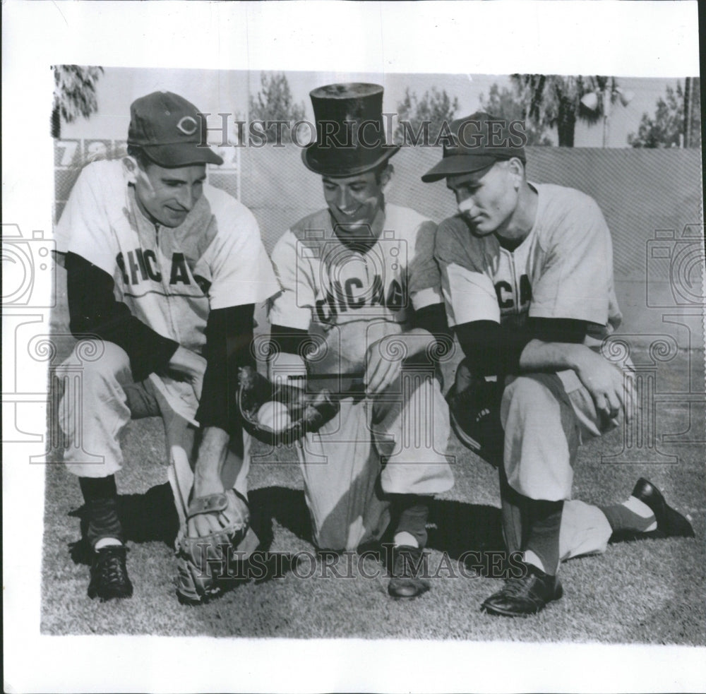 1955 Pitcher waves wand over ball and mitt - Historic Images