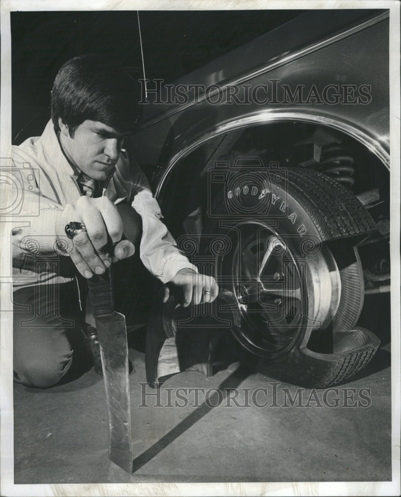 1978 a representative from Goodyear tries out new tire - Historic Images