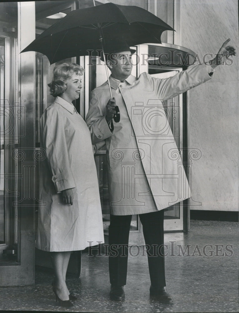 1963 Raincoat waterproof Scotchgard - Historic Images