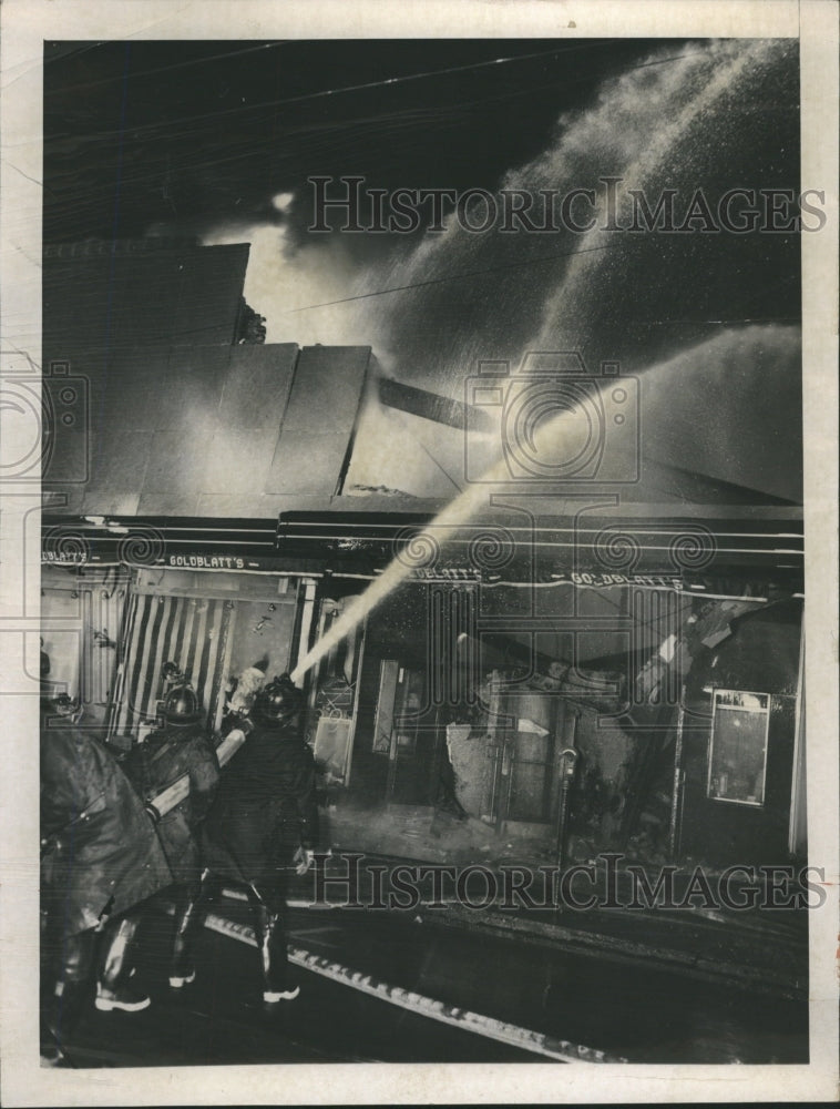 1956 Roof fireman water buckles Fire - Historic Images
