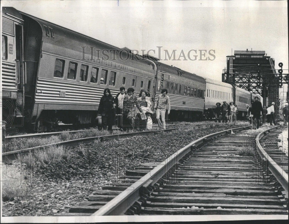 1972 Passengers of the derailed train - Historic Images
