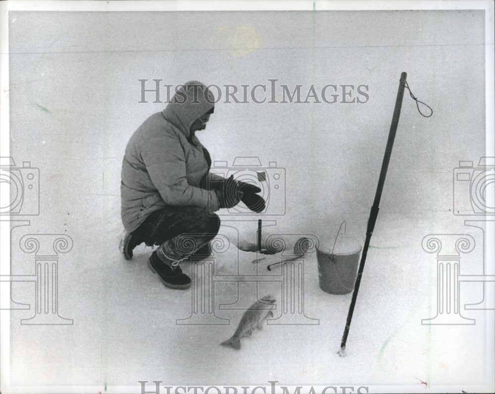 1977 Ice fishing - Historic Images