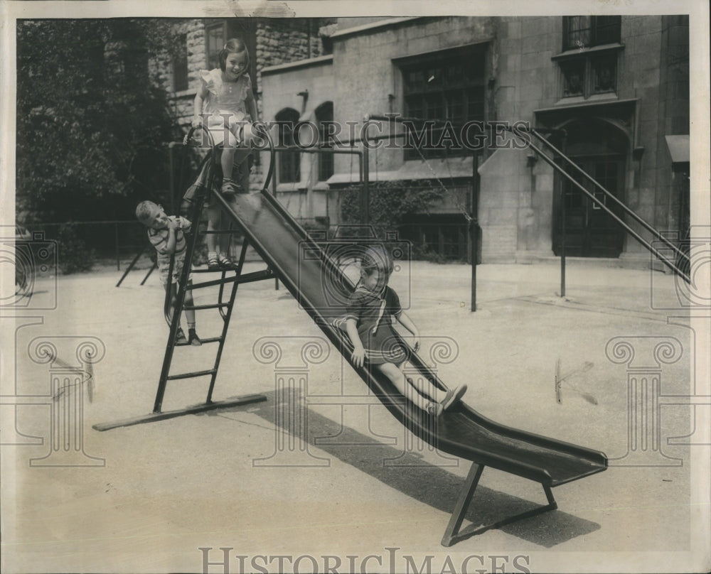 1951 Press Photo Children Playground Slide School - Historic Images