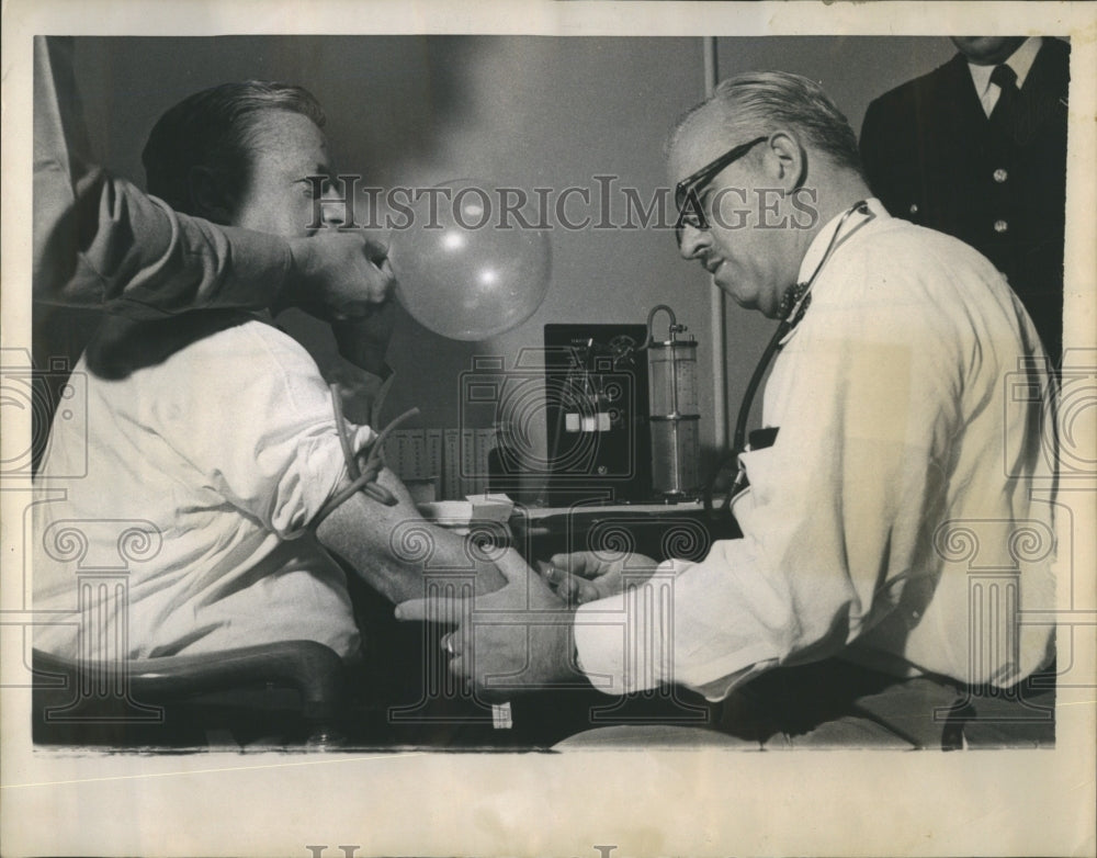 1957 Bill Madden Drinking Balloon Test - Historic Images
