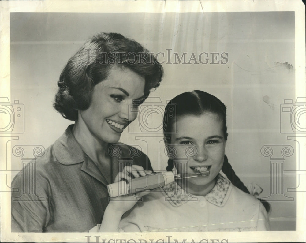 1961 Battery-Operated ToothBrush - Historic Images
