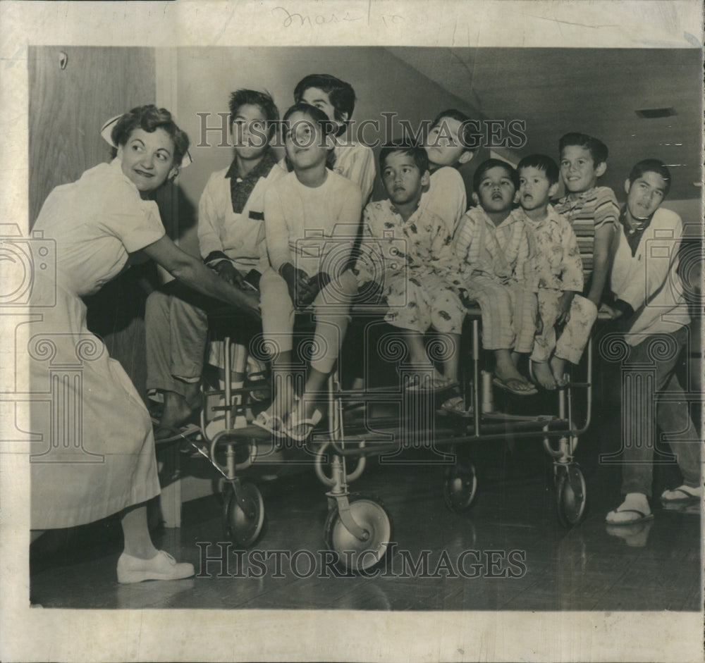 1961 Ted Seto Children Nurse Lucy  Gardena - Historic Images