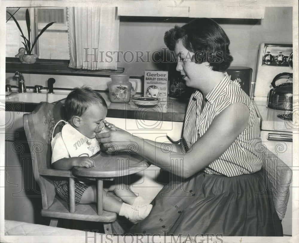 1957 Feeding Baby Economics Kitchen Nancy - Historic Images