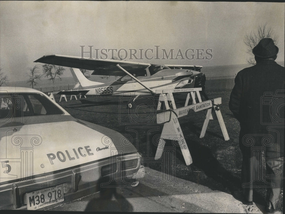 1969 Plane Lands Near Drive - Historic Images