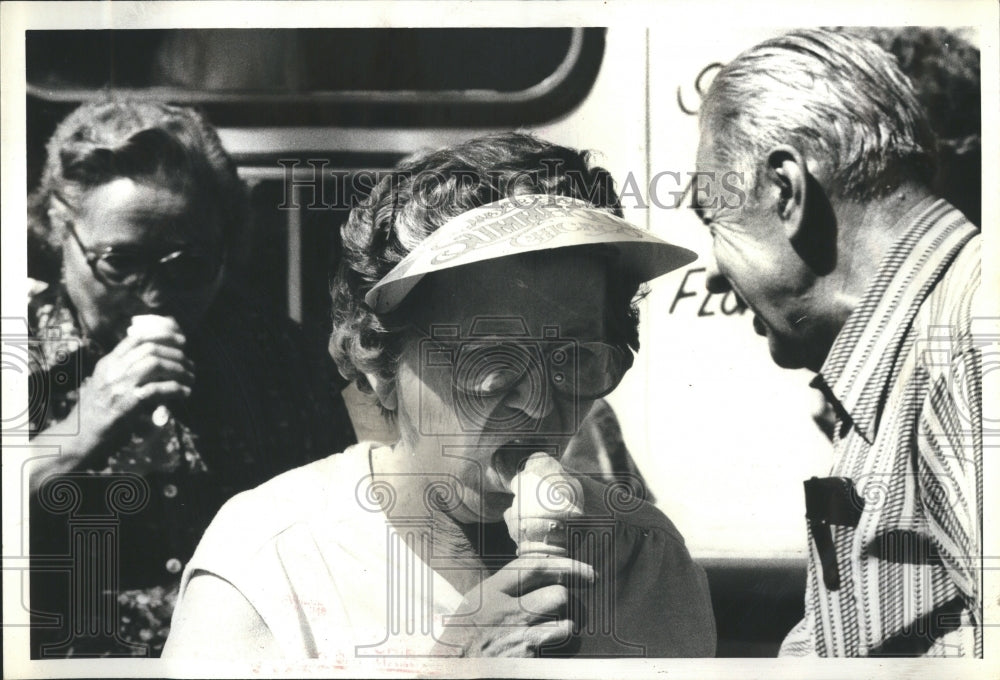 1979 Senior citizen eats ice cream at McKin - Historic Images